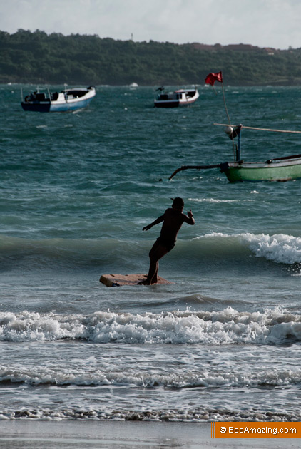 Surfing at Kelan Beach